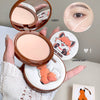 Compact powder with mirror and fox design, held by a hand, with close-up of eye before and after application.
