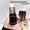 Hand holding a GEGE BEAR cosmetic stick with a close-up of the product on a light background