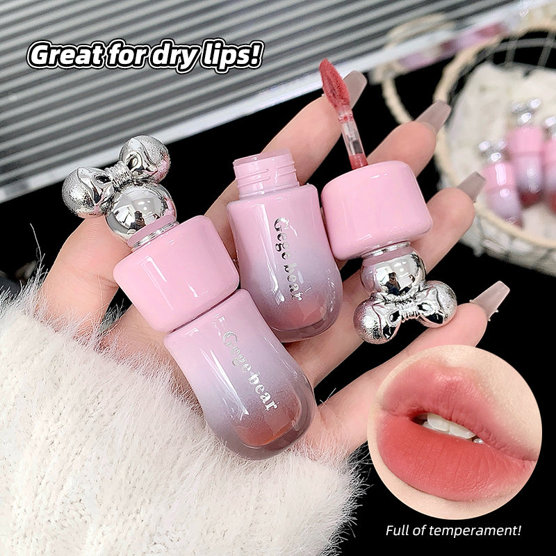 Hand holding three small pink lip products with a close-up of lips wearing the product, text 'Great for dry lips!' and 'Full of temperament!'.