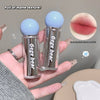 Two clear lip glosses with blue caps held in a hand, labeled 'Gege bear'. Inset shows a close-up of lips with gloss applied.