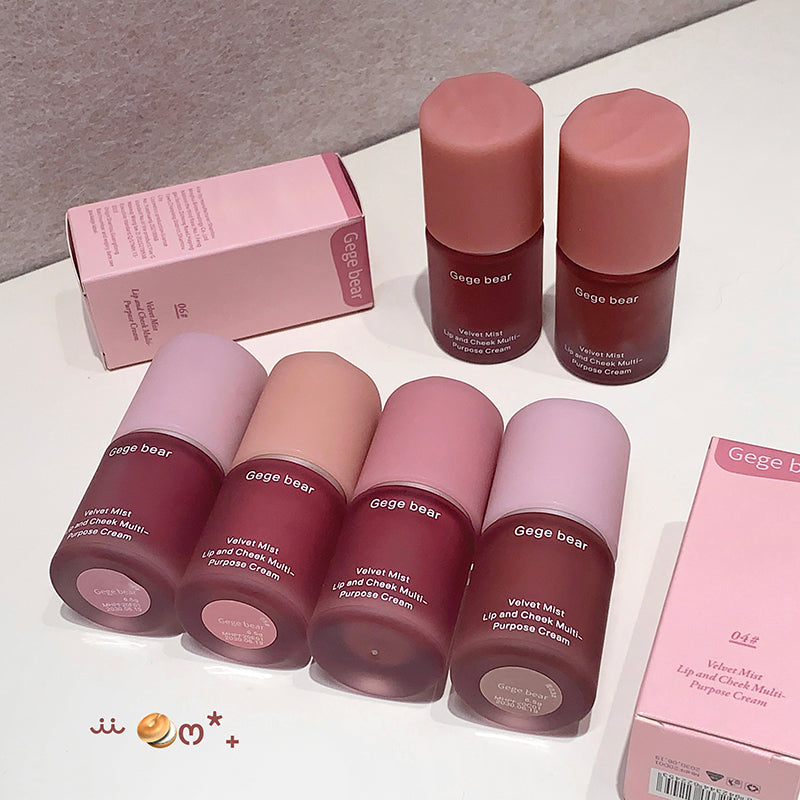 Set of Gege bear lip and cheek melts with pink packaging on a white surface.