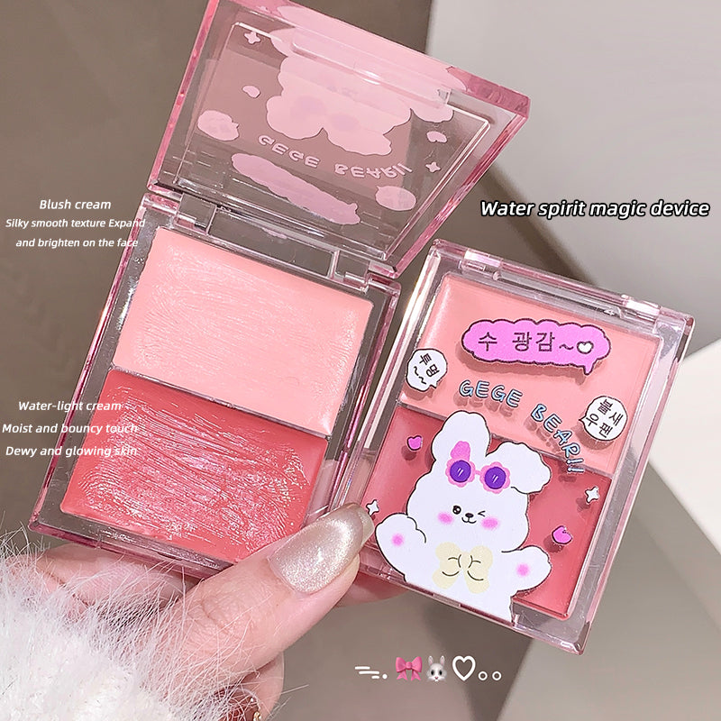 Pink blush cream with packaging featuring a cartoon character, held by a hand.