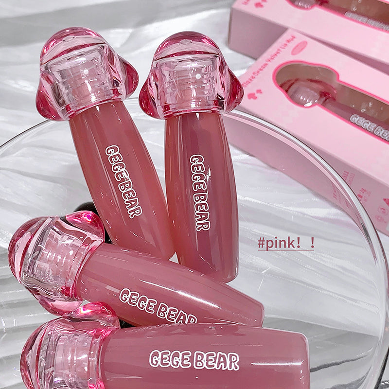 Pink lip gloss bottles with 'GEGE BEAR' branding on a white background