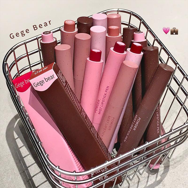Basket filled with pink and brown lipsticks labeled 'Gege Bear' on a light background.