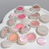 Collection of Gege Bear blushes in various shades on a white surface.