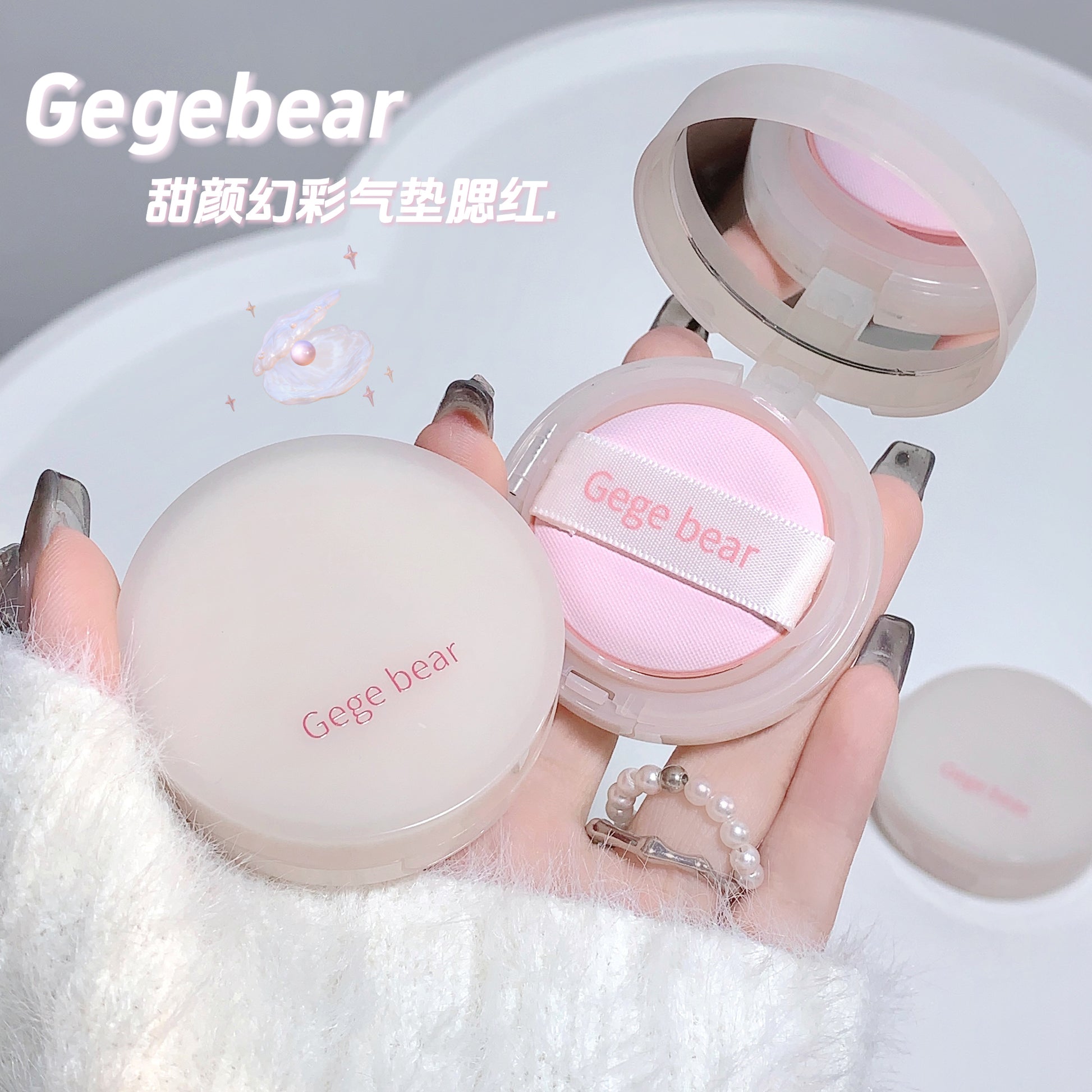Hand holding a Gegebear cosmetic product with a white background