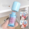 Blue lip gloss bottle with a close-up of lips showing color application