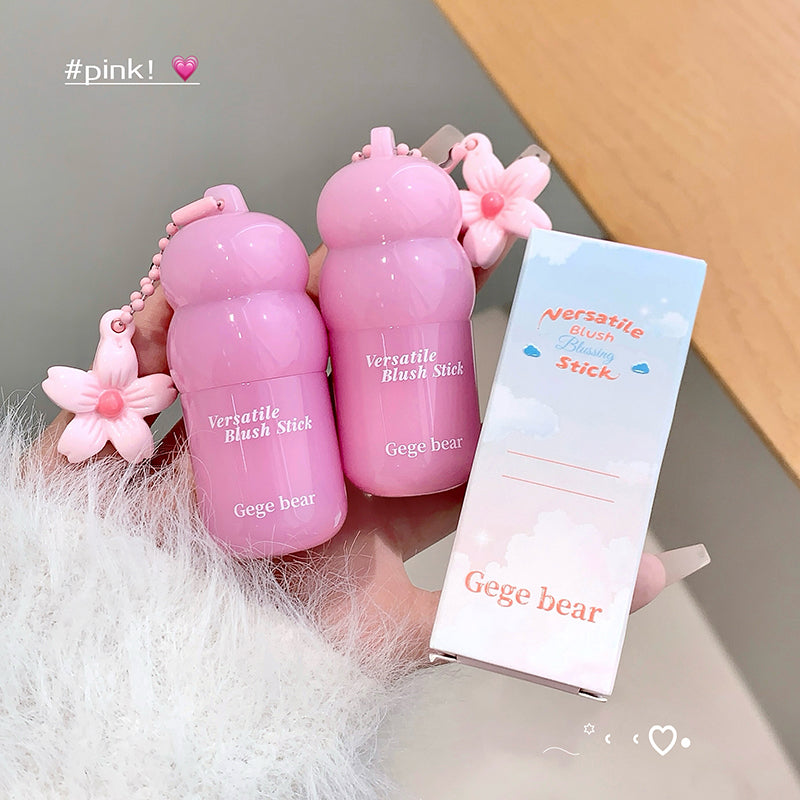 Pink blush sticks with 'Gege bear' branding and a box on a neutral background