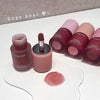 Gege bear lip products including lip gloss and cream on a white surface.