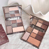 Makeup palettes with 'Gego Bear' branding on a soft surface