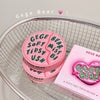 Pink Gege Bear makeup product with text on a metal grid background