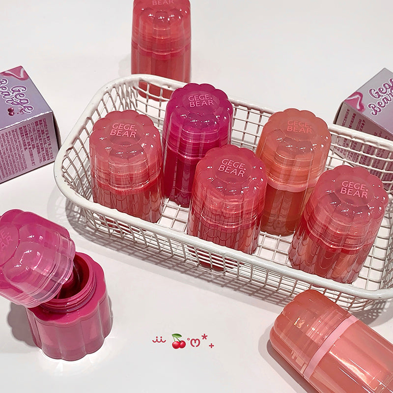 Pink containers with 'GEGE BEAR' branding on a white surface.
