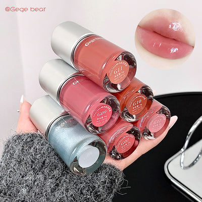 Set of nail polish bottles with a close-up of lips wearing a similar shade.
