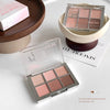 Makeup eyeshadow palette with 'Gee Bear' branding on a white surface.