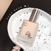 Foundation bottle with 'Gee Bear' branding on a speckled plate