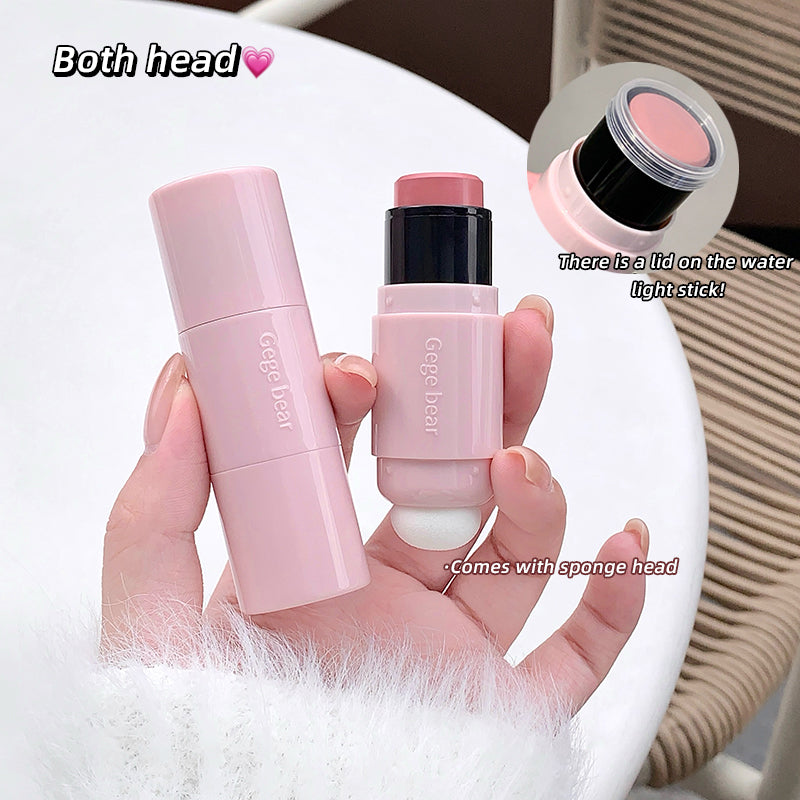 Two pink makeup products held in a hand with text indicating features.