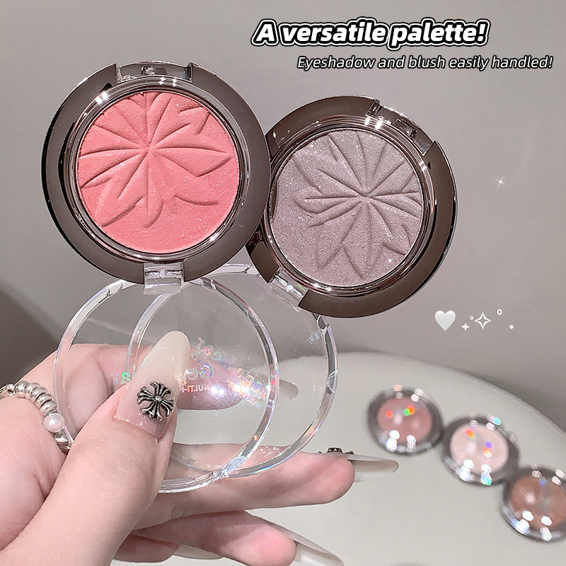 Two makeup compacts with pink and silver shades held by a hand, with text 'A versatile palette! Eyeshadow and blush easily handled!'.
