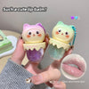 Two cute lip balm containers with a hand holding them, showing a close-up of the lip balm on lips.