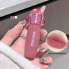 Pink lipstick held by a hand with a close-up of lips and product details.
