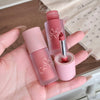 Two pink lip products with 'Gooseberry' branding held in a hand.