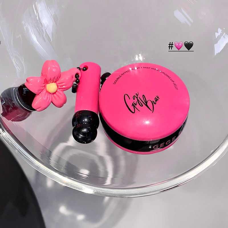 Pink makeup compact with floral design on a clear background