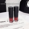 Two black and red lip and cheek products with 'Gege bear' branding on a white surface.