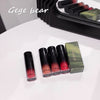 Set of Gege Bear lip glosses with packaging on a white surface