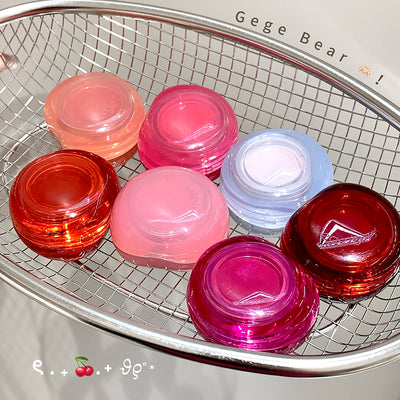 Colorful small containers on a metal grid with 'Gee Bear' branding.