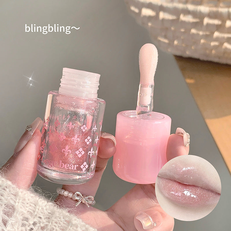 Pink nail polish bottle and applicator held by a hand, with 'blingbling~' text.
