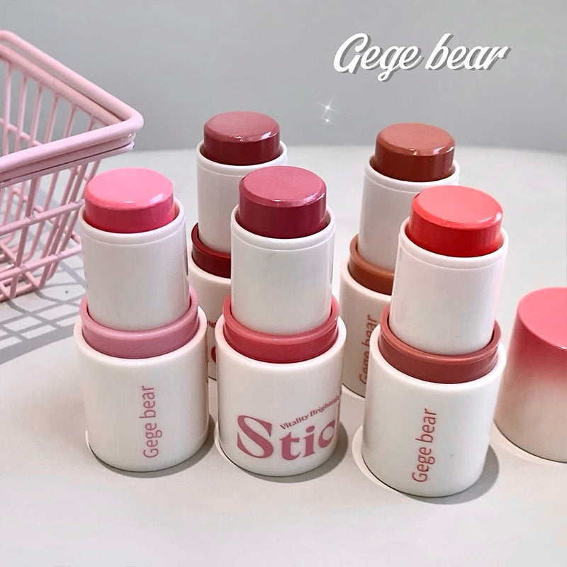 Set of Gege bear lipsticks with pink and red caps on a light surface.