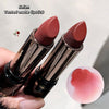 Two matte lipstick tubes with a swatch of color on a light background