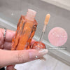 Hand holding a cosmetic dropper bottle with a pink cap, close-up of the product, and a pink droplet on a neutral background.