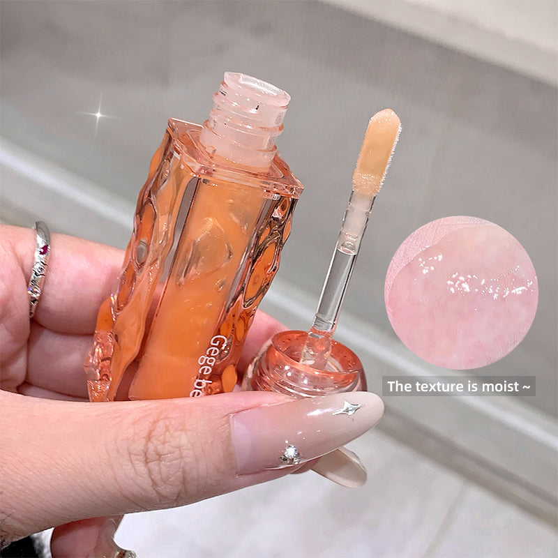 Hand holding a cosmetic dropper bottle with a pink cap, close-up of the product, and a pink droplet on a neutral background.