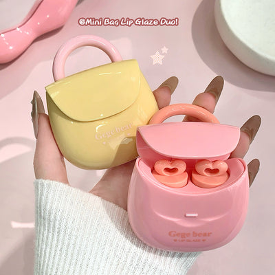 Two small cosmetic cases, one yellow and one pink, held by a hand on a light pink background.