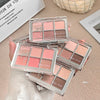 Makeup palettes with 'Gige bear' branding on a beige surface