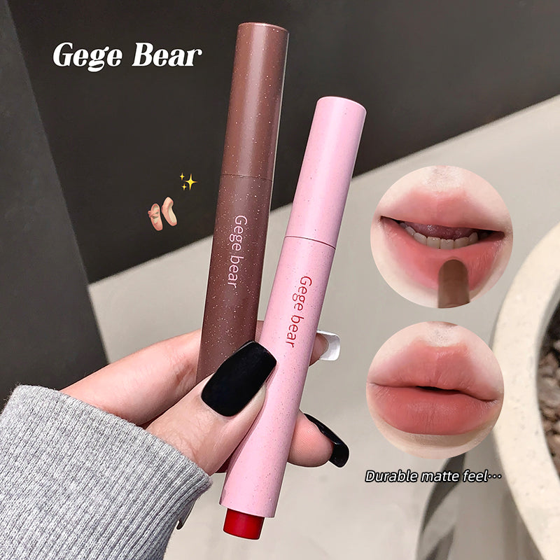 Two lip products held by a hand with a blurred background, featuring 'Gege Bear' branding.