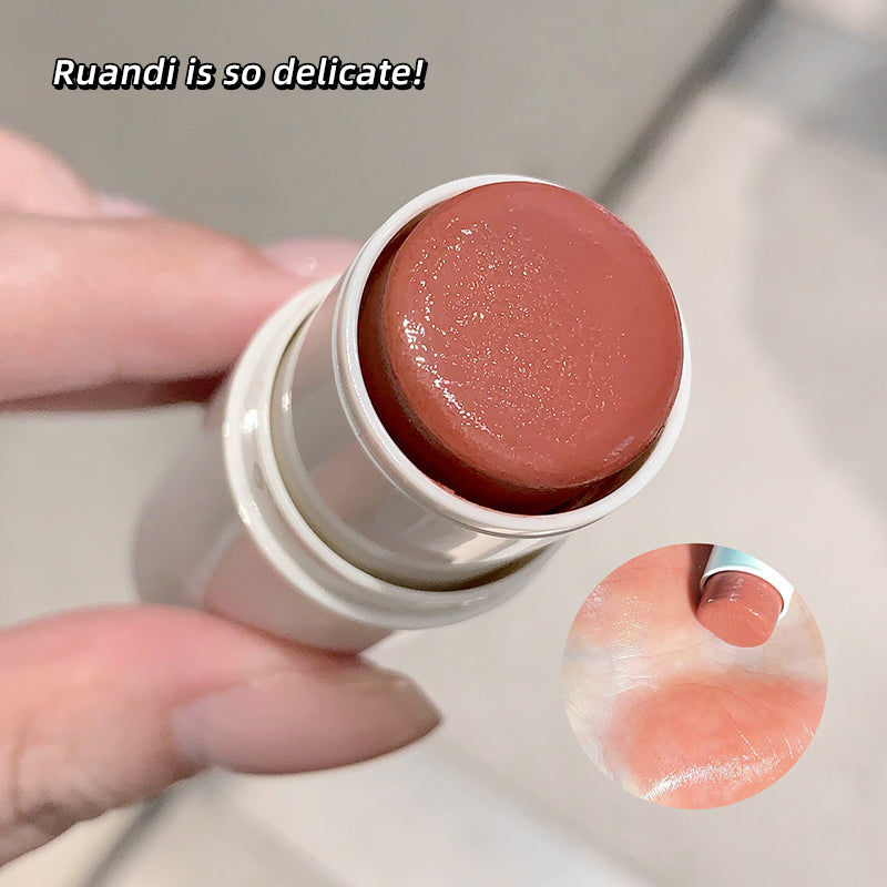 Lip balm with a close-up of the product on a neutral background