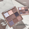 Makeup eyeshadow palette with various shades on a light background