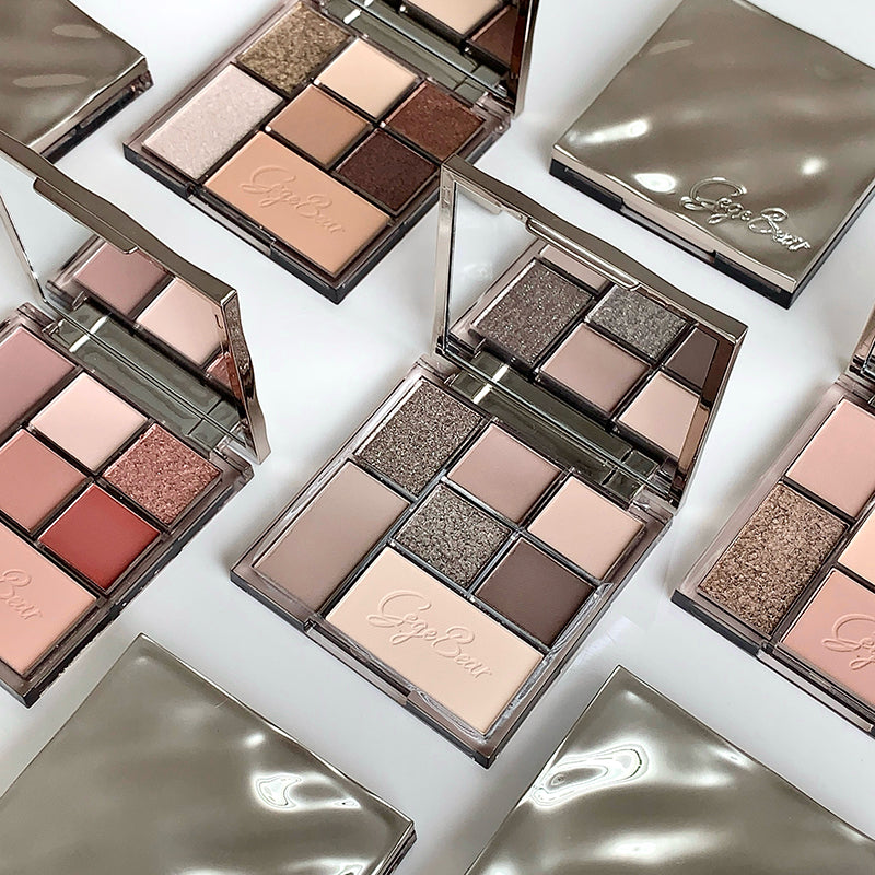 Makeup eyeshadow palettes with 'Gigi' branding on a white background