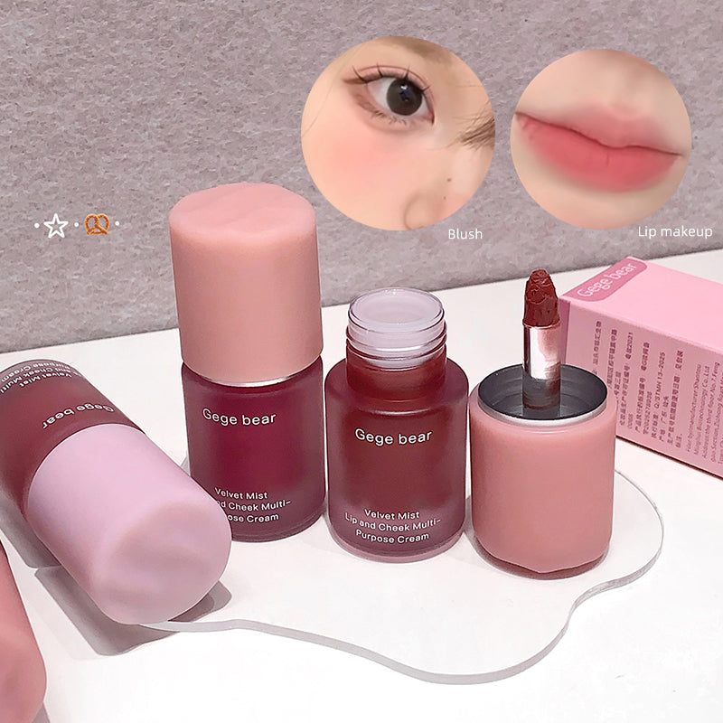 Set of cosmetic products with close-up images of eye and lip makeup on a gray background.