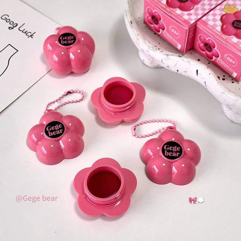Pink flower-shaped containers with 'Gege bear' branding on a white surface.