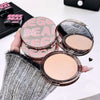 GEGE BEAR makeup compact held by a hand with a blurred background