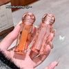 Two lip products held in a hand with 'Gee Bear' branding.