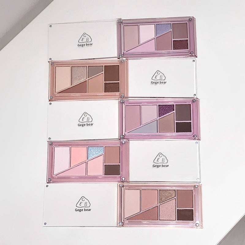 Set of makeup eyeshadow palettes with 'Gige bear' branding on a white background