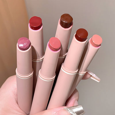 Set of lipsticks with visible brand 'Gege bear' on a neutral background