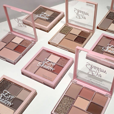 Makeup eye shadow palettes with 'Gosh' branding on a white background