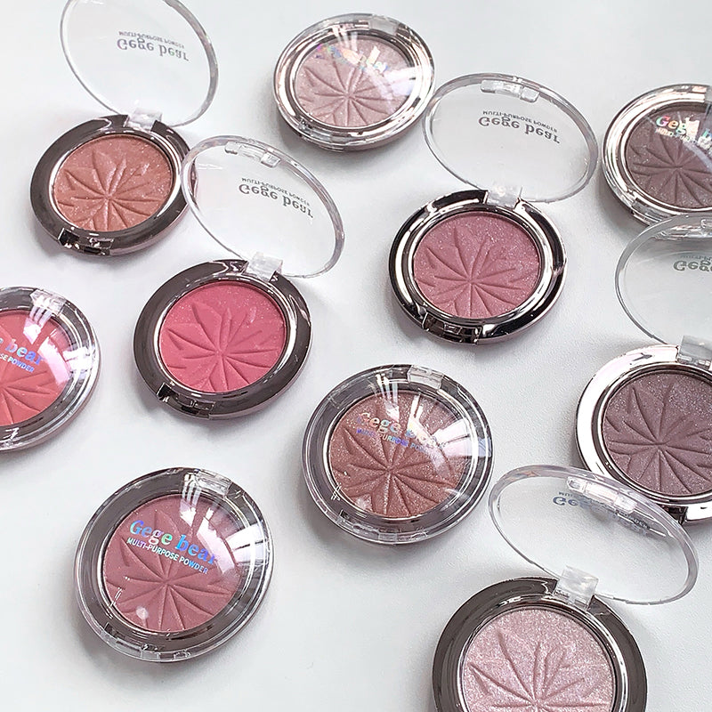 Multiple compact blushes with visible brand name on a light background
