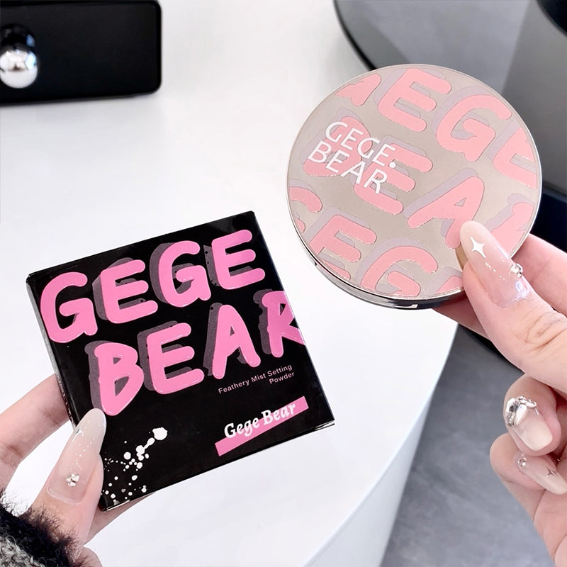 GEGE BEAR makeup product packaging held by a person