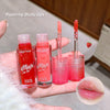 Hand holding three lip oil products with visible text and close-up of lips.