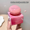 Pink cosmetic product with 'Gege bear' branding held by a hand against a neutral background.